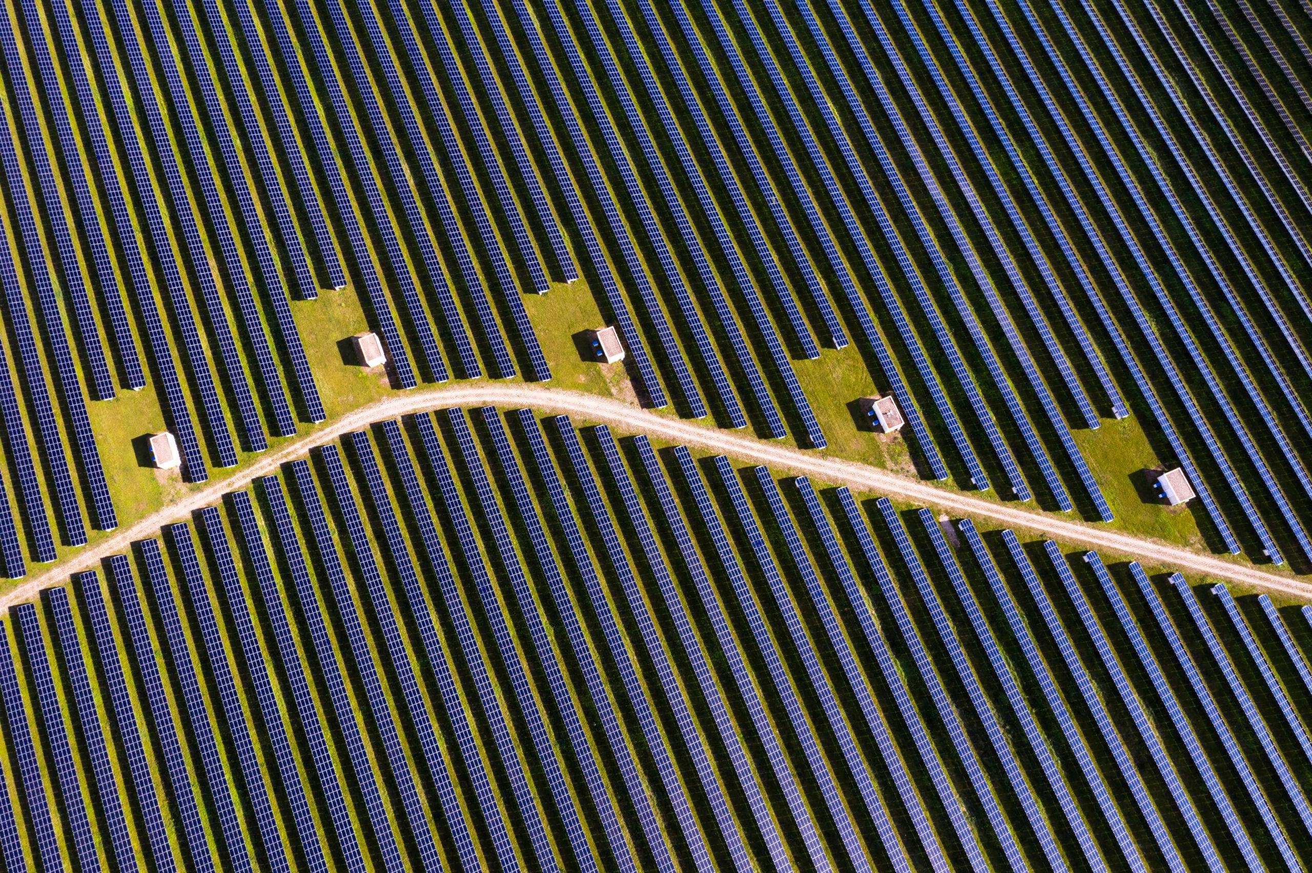 Renewable energy plants, aerial view of solar panels.