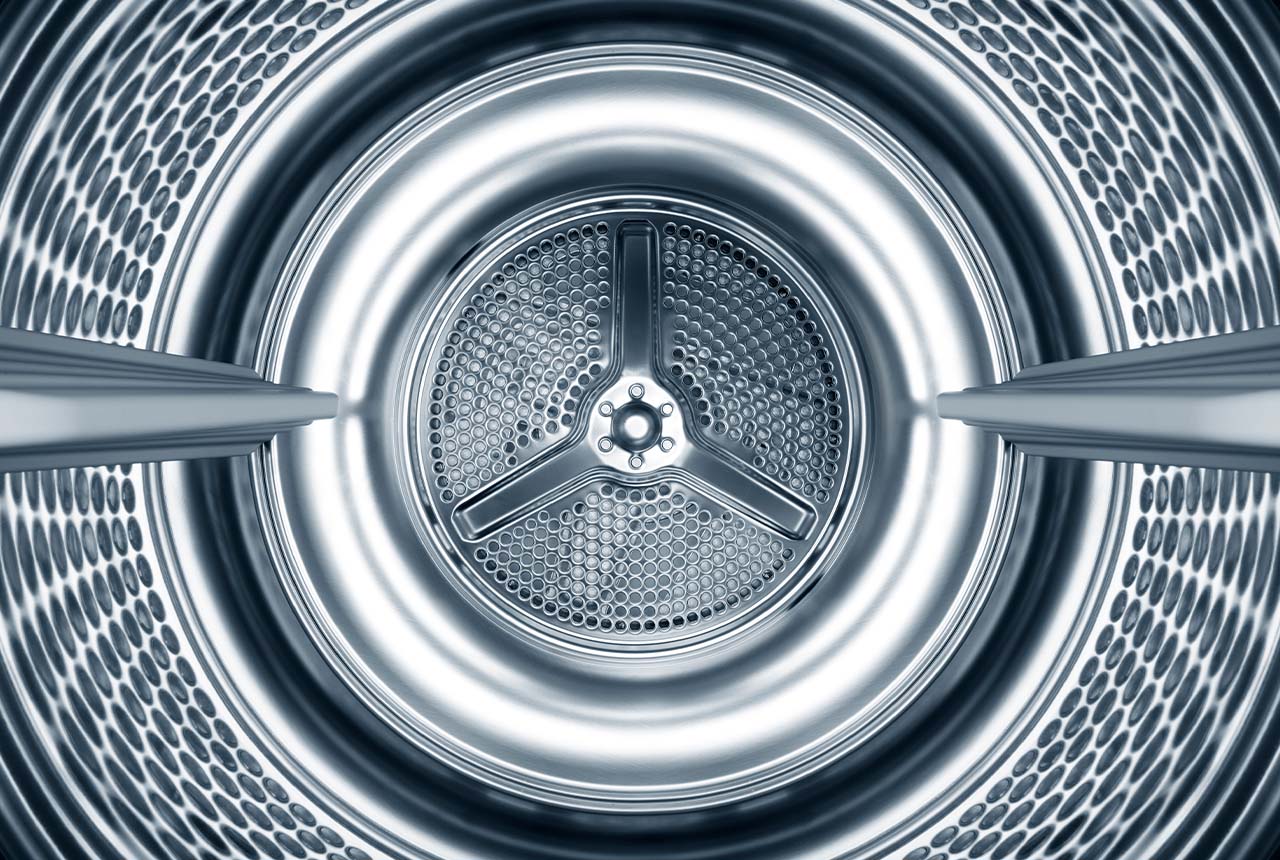 Inside the steel drum of a washing machine