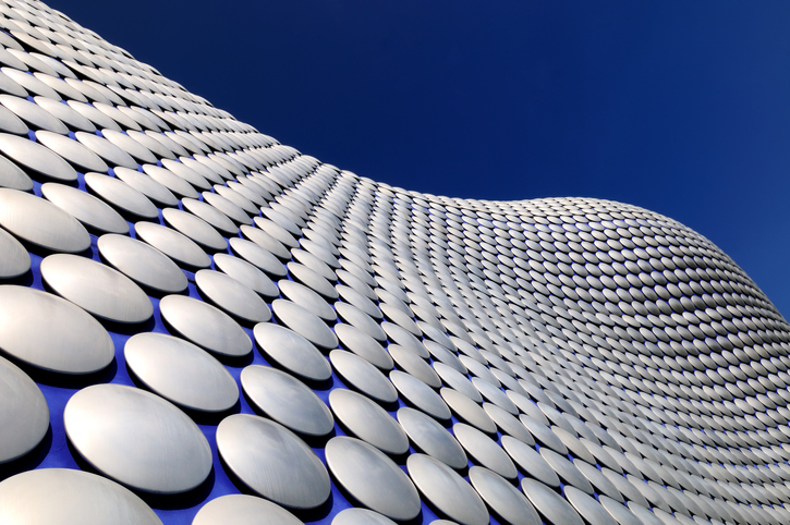 A wide angle view of the very modern and iconic Bullring building in Birmingham, England.