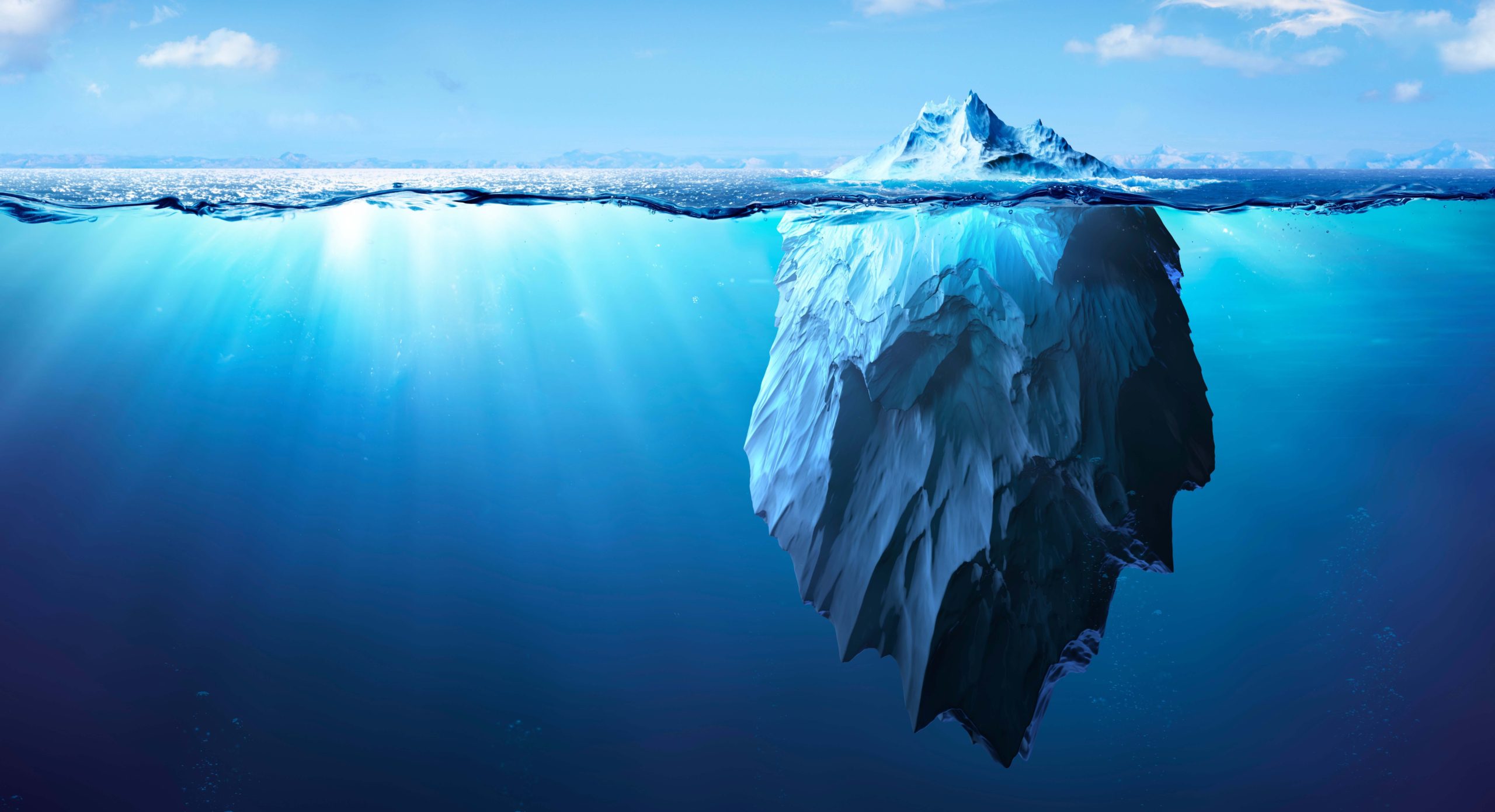 iceberg half submerged in arctic