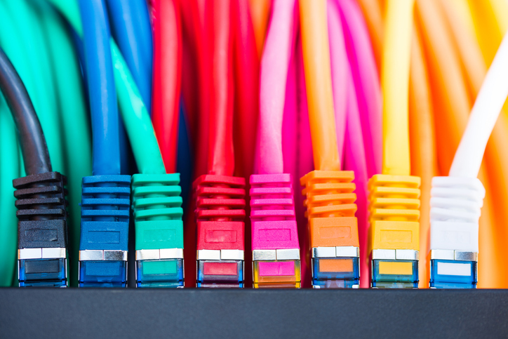 Colorful network cables connected to a switch