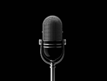 podcast microphone on black background