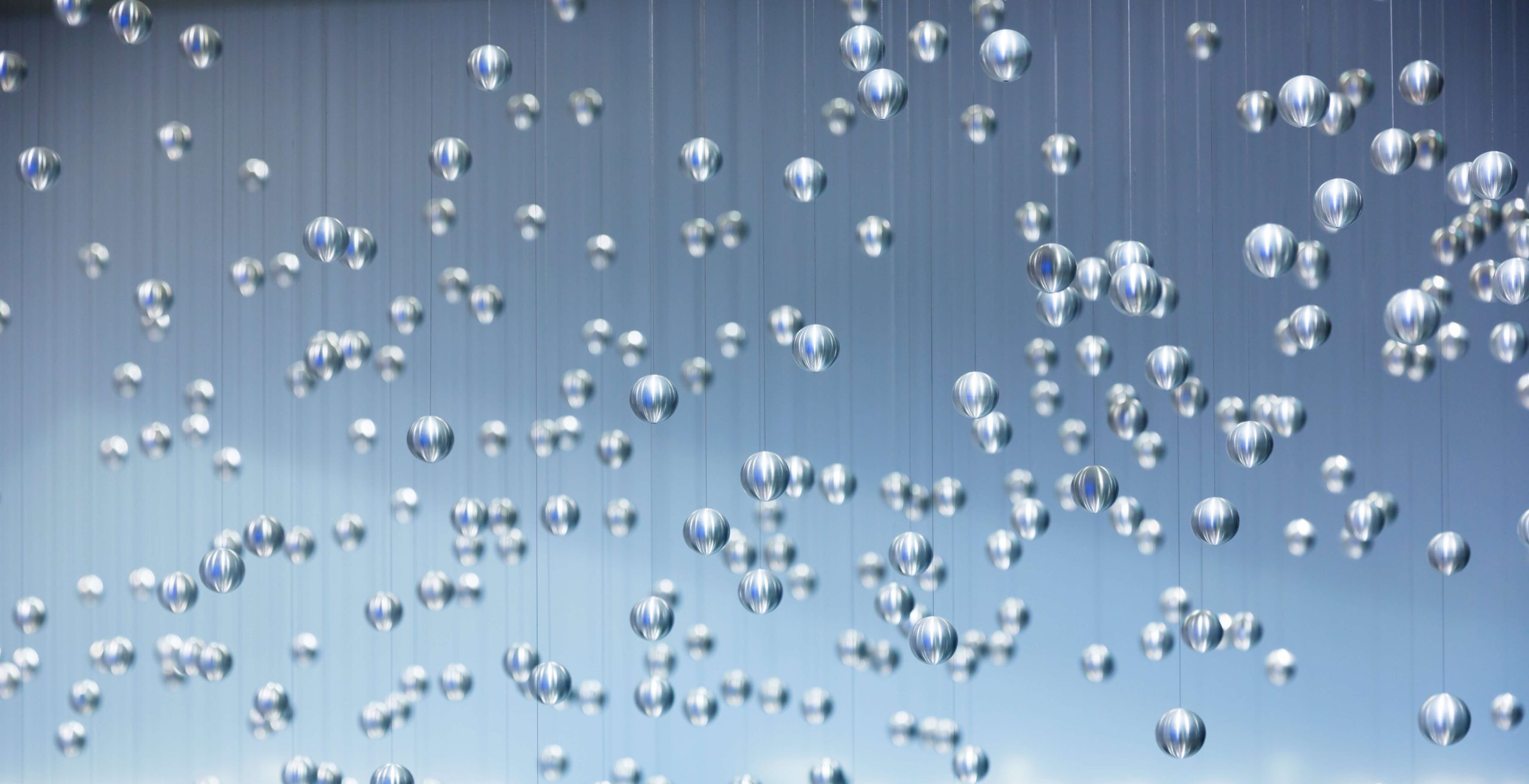 Bubbles rising on blue background